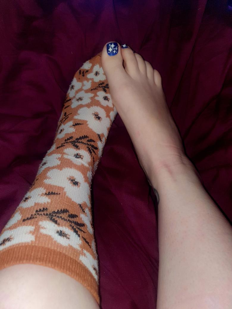 Socken von schönen Füßen