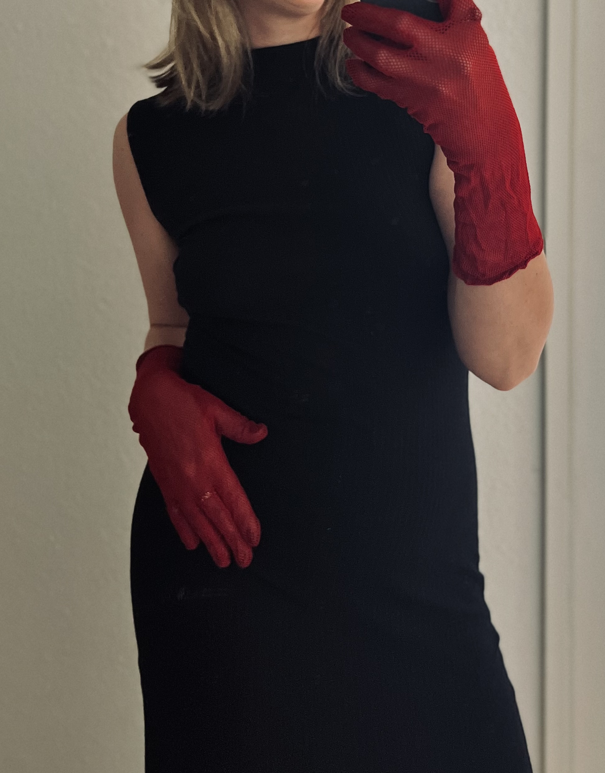 Rote Netzhandschuhe